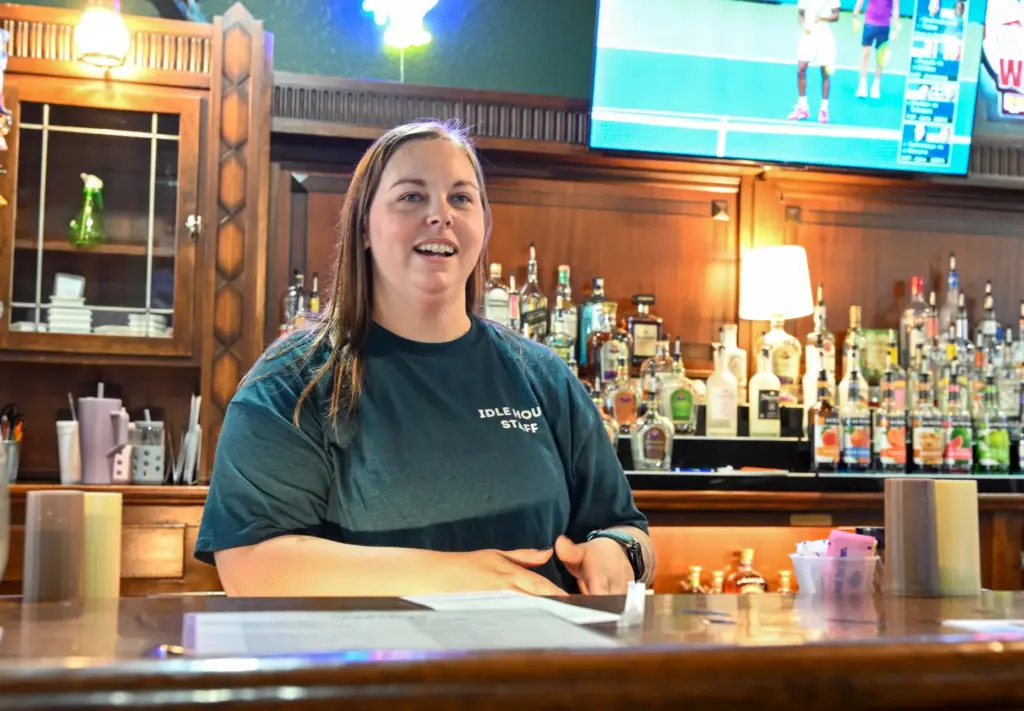 Bartender Ali Harbin at the Idle Hour bar in Anthony,...