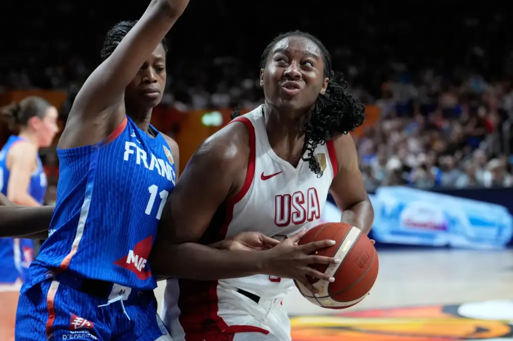 France’s Valeriane Ayayi, left, guards Team USA’s Aliyah Boston during...