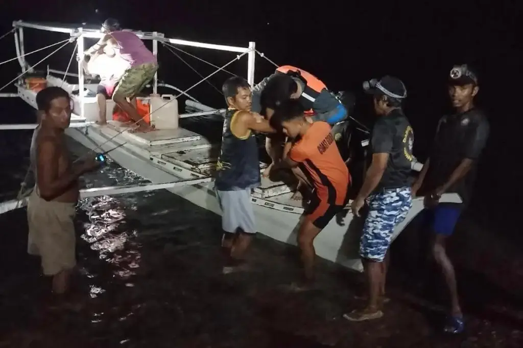 In this image provided by the Philippine Coast Guard, a...