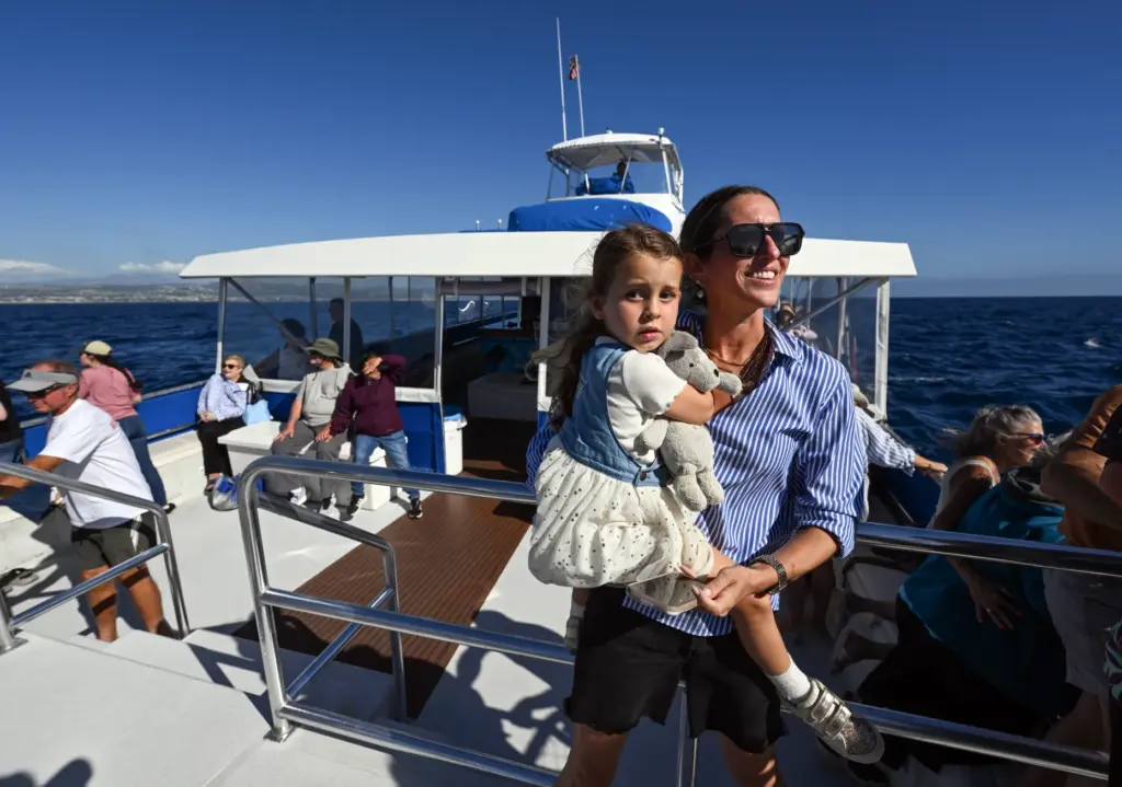 Kristen Merjanian and her daughter, Olivia Merjanian, 4, check out...