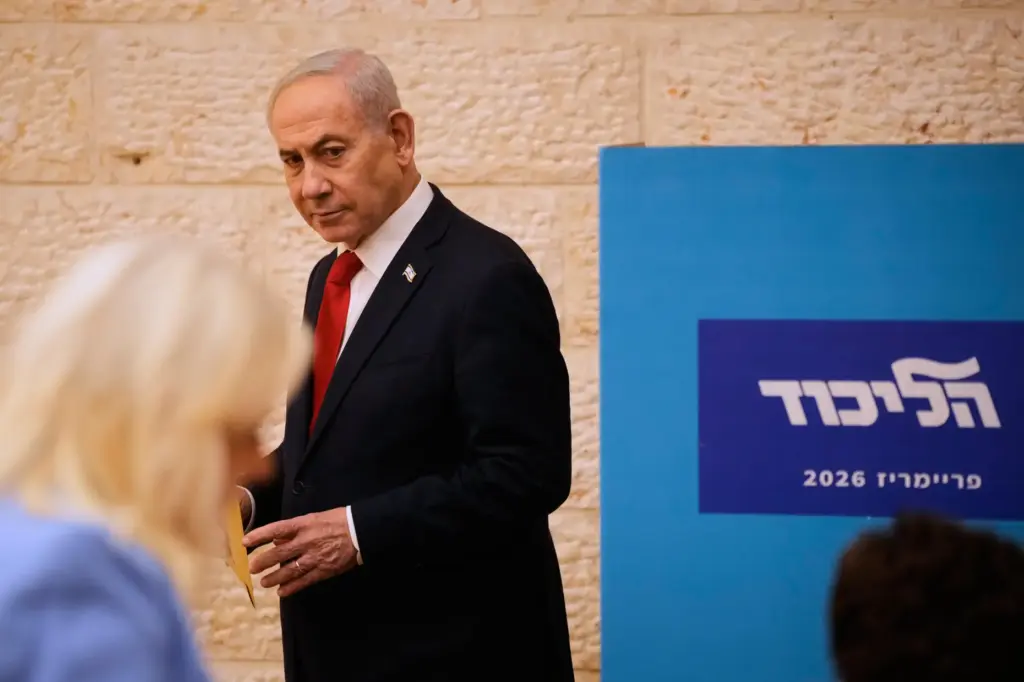 Israeli Prime Minister Benjamin Netanyahu casts his ballot.