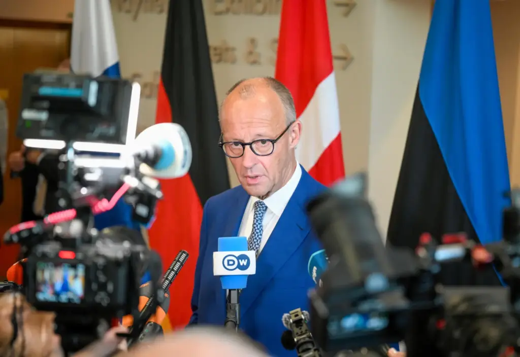 Federal Chancellor of Germany Friedrich Merz speaks to media during...
