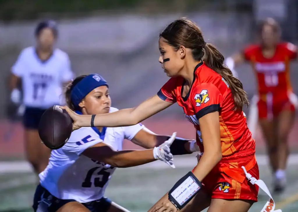 Beckmanâs Giselle Looney, left, canât get to Mission Viejo quarterback...