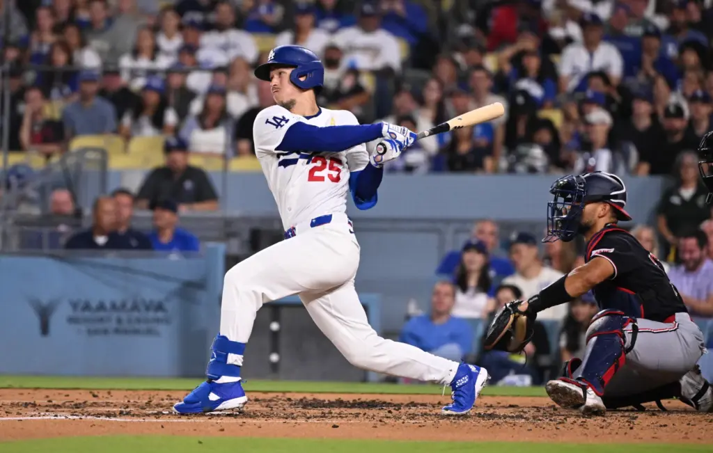 Dodgersâ Tommy Edman singles against the Washington Nationals during the...