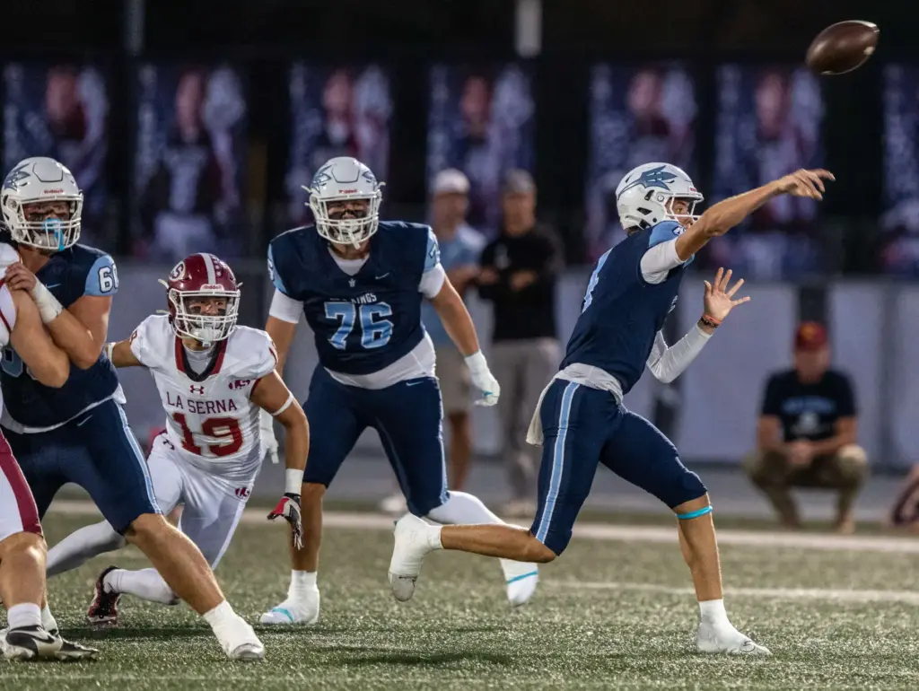 Corona del Mar quarterback John David Annett (4) throws the...