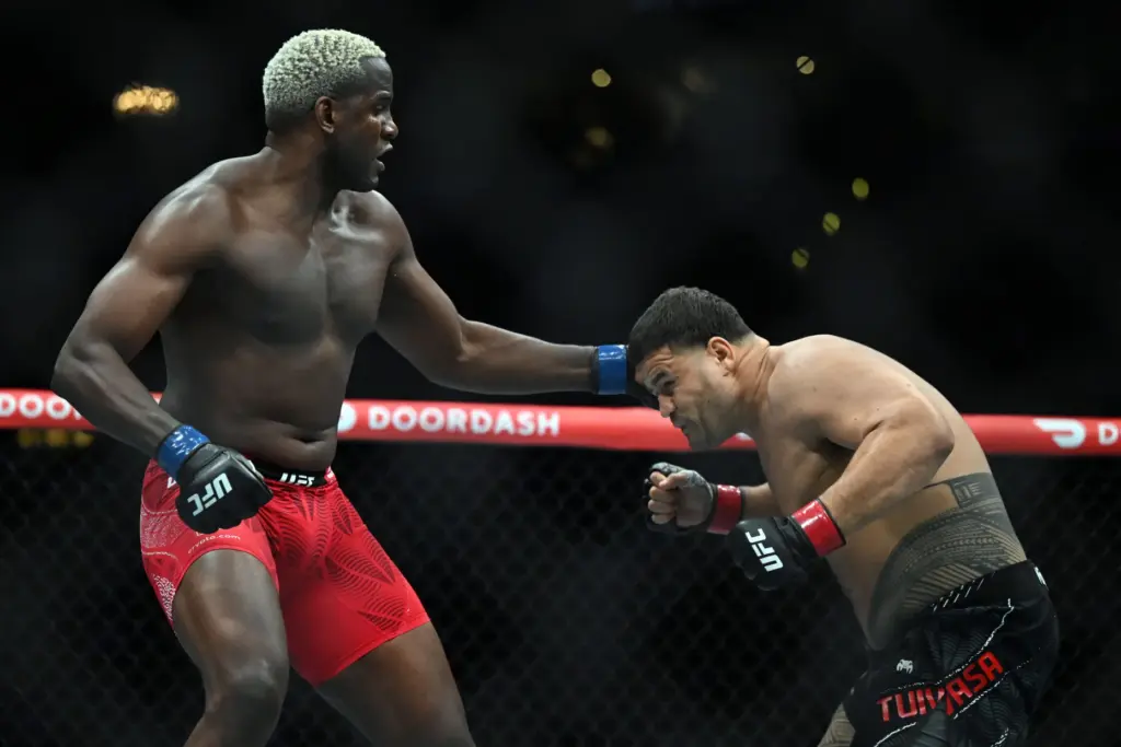 Tai Tuivasa (red) vs. Robelis Despaigne (blue) during their fight...