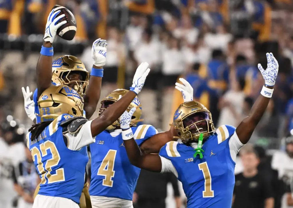 Defensive lineman Sahir West (15) of the UCLA Bruins reacts...