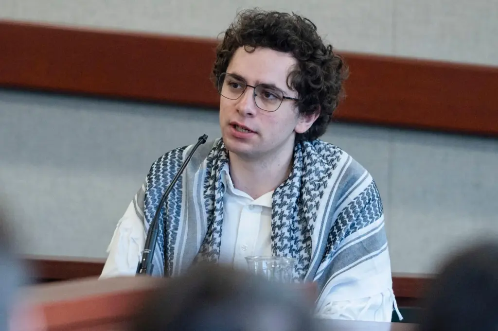 Hisham Awartani testifies in court during Jason Eaton’s trial in...