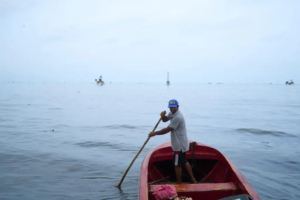 A fisherman steers his boat on Lake Maracaibo in Cabimas, Venezuela.