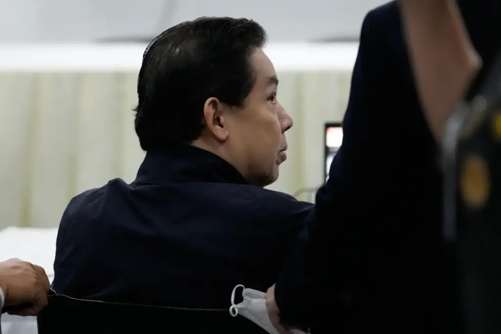 Philippines former House Speaker Martin Romualdez waits for the start of his arraignment.