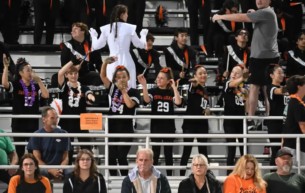 The Huntington Beach Guards cheer on their team, September 18,...