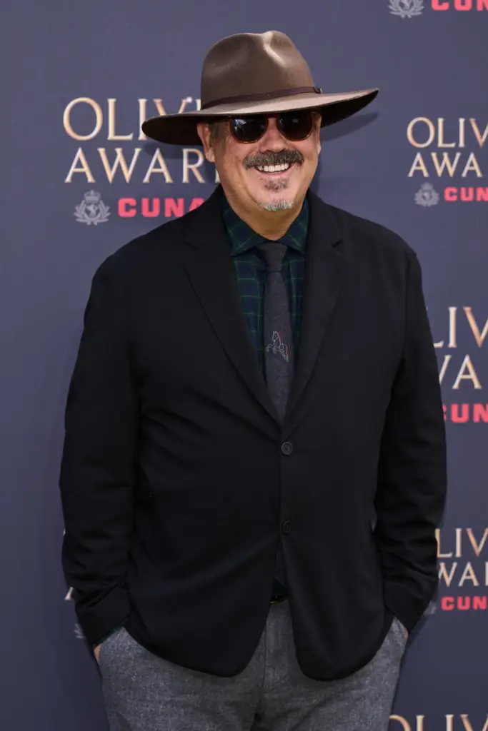 Duncan Sheik poses for photographers upon arrival at the Olivier Awards.