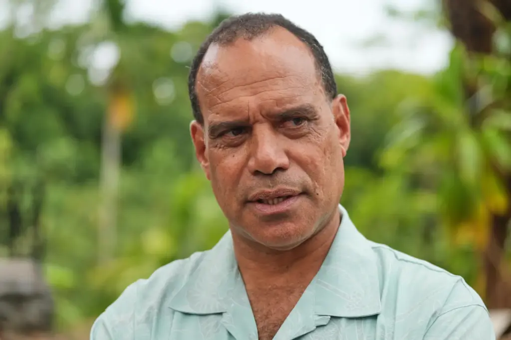 Vanuatu Minister for Climate Change Adaptation Ralph Regenvanu speaks to reporters.