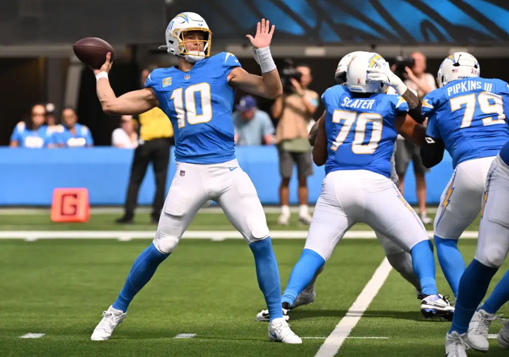 Chargers quarterback Justin Herbert (10) passes against the Arizona Cardinals...