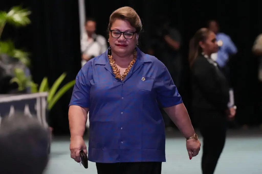Samoa's Deputy Prime Minister Mulipola Anarosa 'Ale Molio'o walks to her seat.