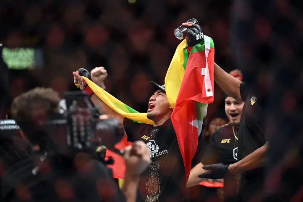 Joshua Van celebrates his victory over Alexandre Pantoja tduring their...