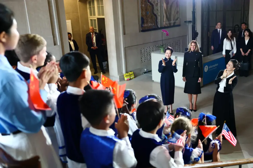 First lady of China Peng Liyuan, from left, and first...