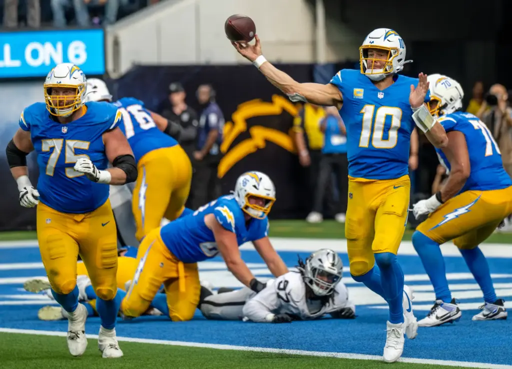 Chargers quarterback Justin Herbert (10) throws the ball during the...