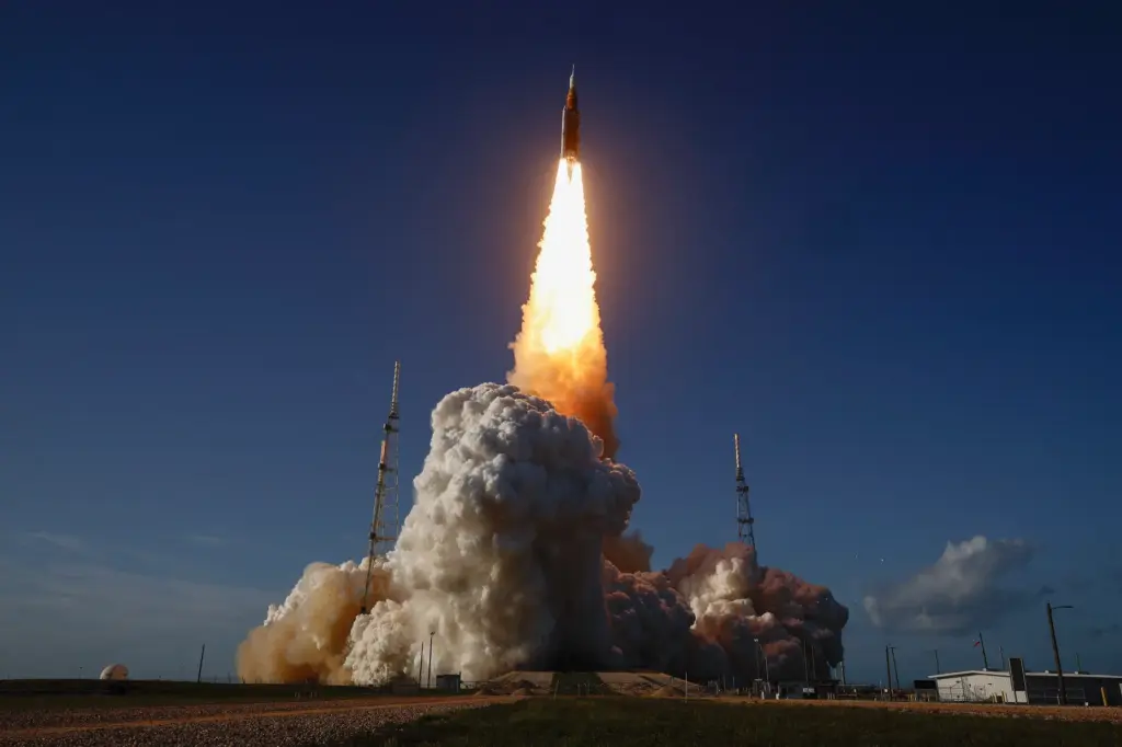 NASA’s 322-foot-tall Artemis II Space Launch System rocket and Orion...