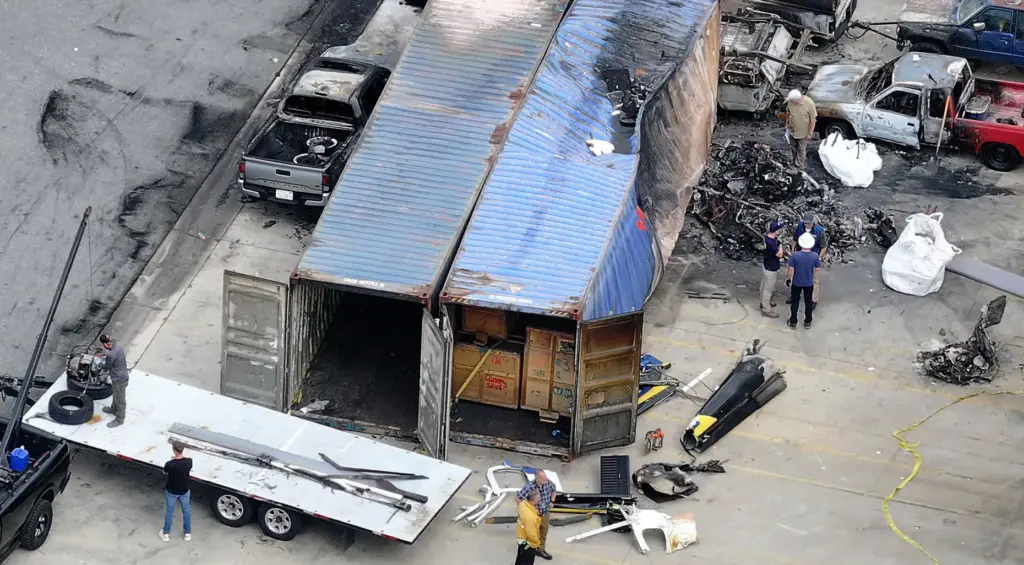 The NTSB supervises the removal of the NBC4 helicopter from...