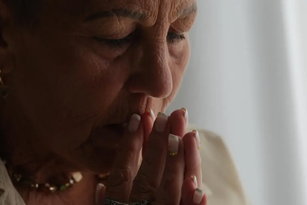 Deb Robertson pauses to reflect during an interview at her home.