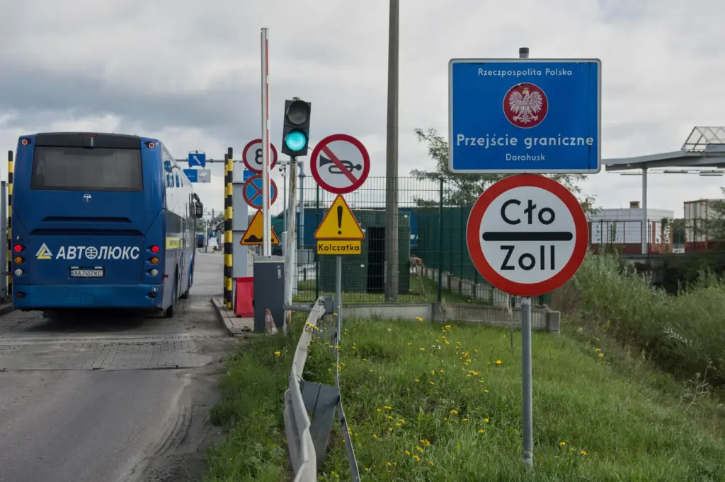 A bus drives past the security checkpoint at the Dorohusk-Jagodzin...