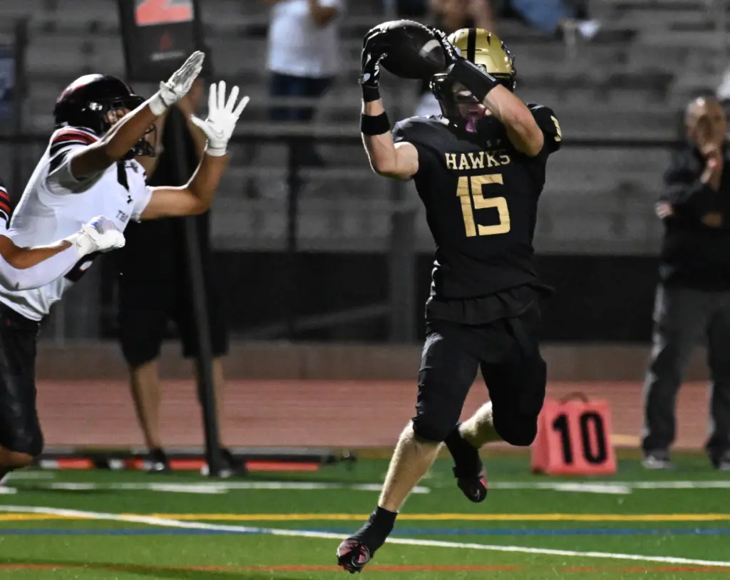 Justin Karg #15 of El Dorado catches a touchdown pass...