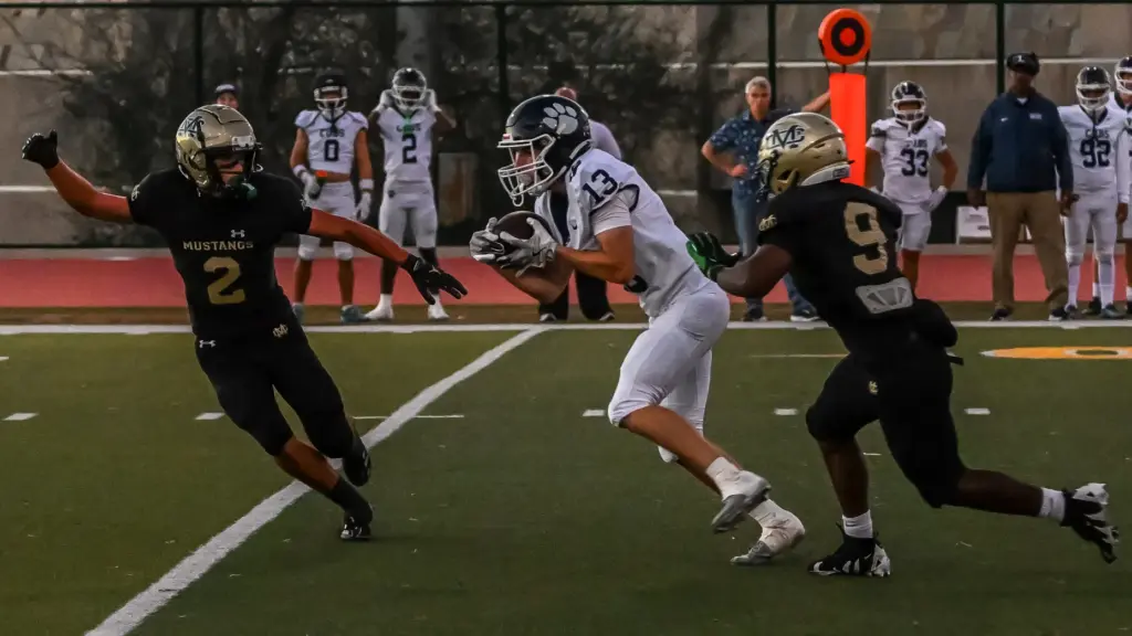 Loyola wide receiver Sam Friend carries the ball after making...