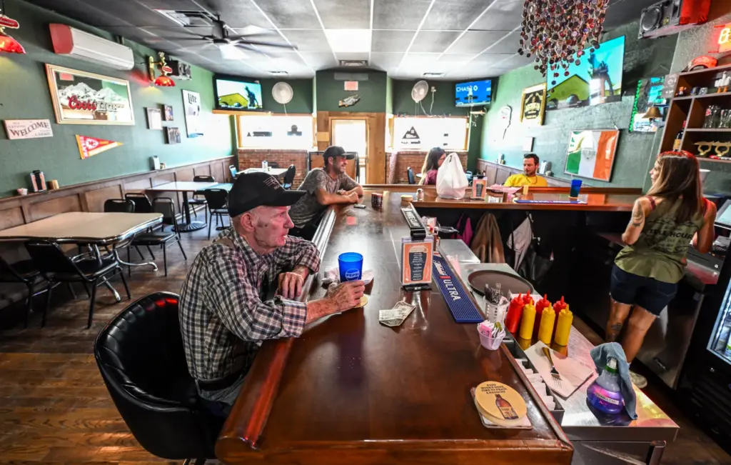 Earl Ratliff has lunch at the Idle Hour bar in...