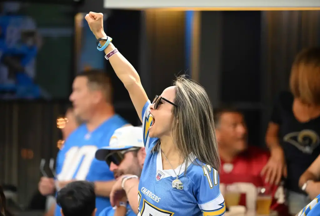 A Chargers fan reacts during the second half of an...