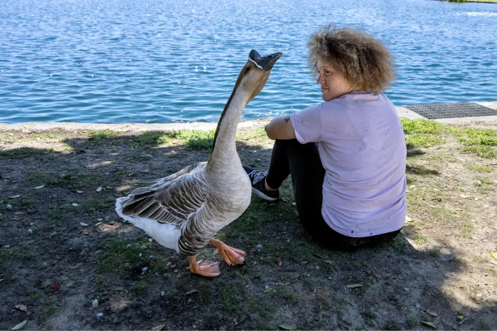 Lesa Lockridge enjoys the company of her feathered friend, Greg,...