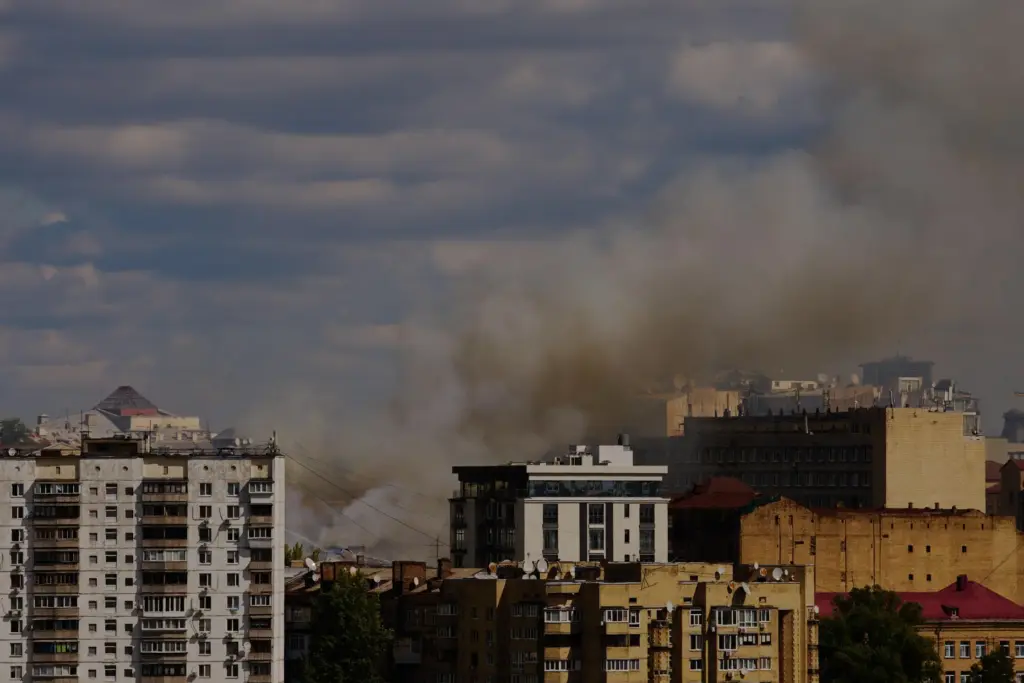 Smoke rises after a Russian drone attack in downtown Kyiv.