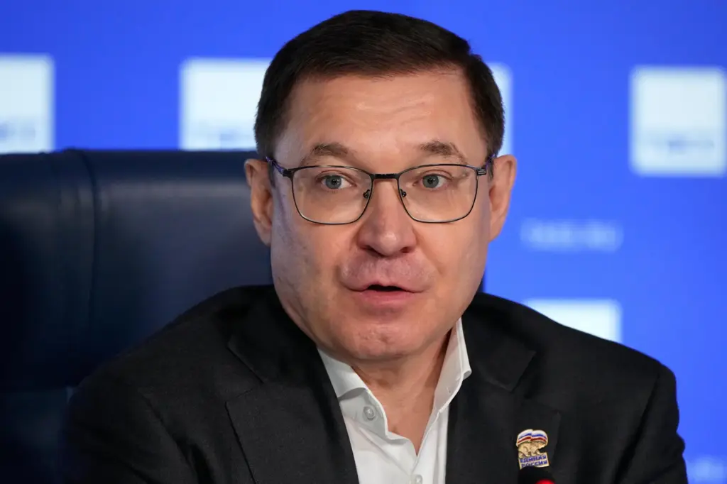 Vladimir Yakushev speaks during a news conference.