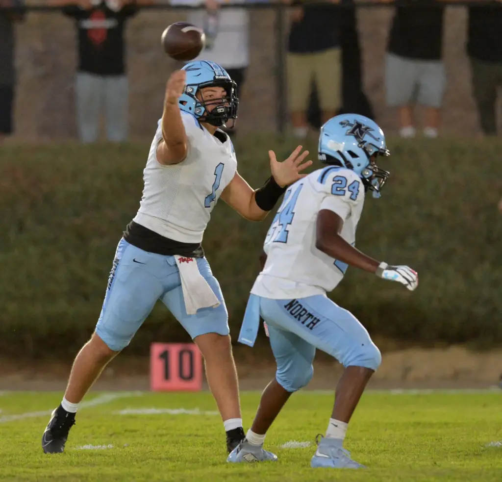 North Torrance QB Ezra Siitia throws against Mary Star in...