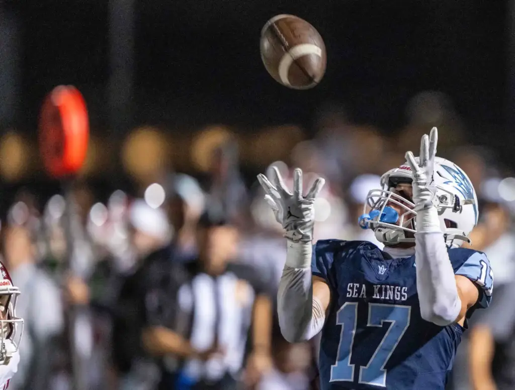 Corona del Mar wide receiver Tucker Murray (17) catches the...