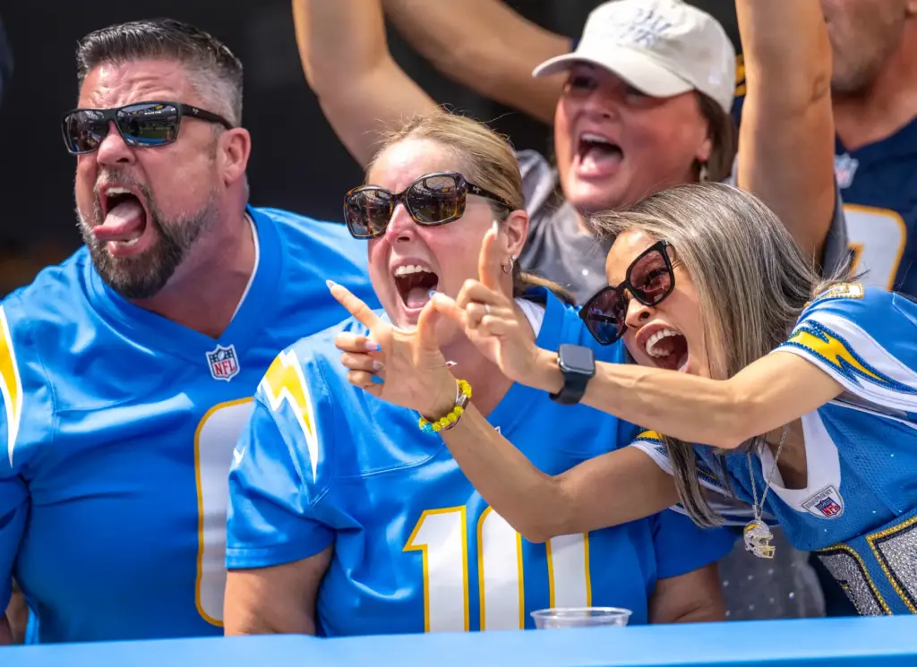 Fans cheer on the Chargers during a game against the...
