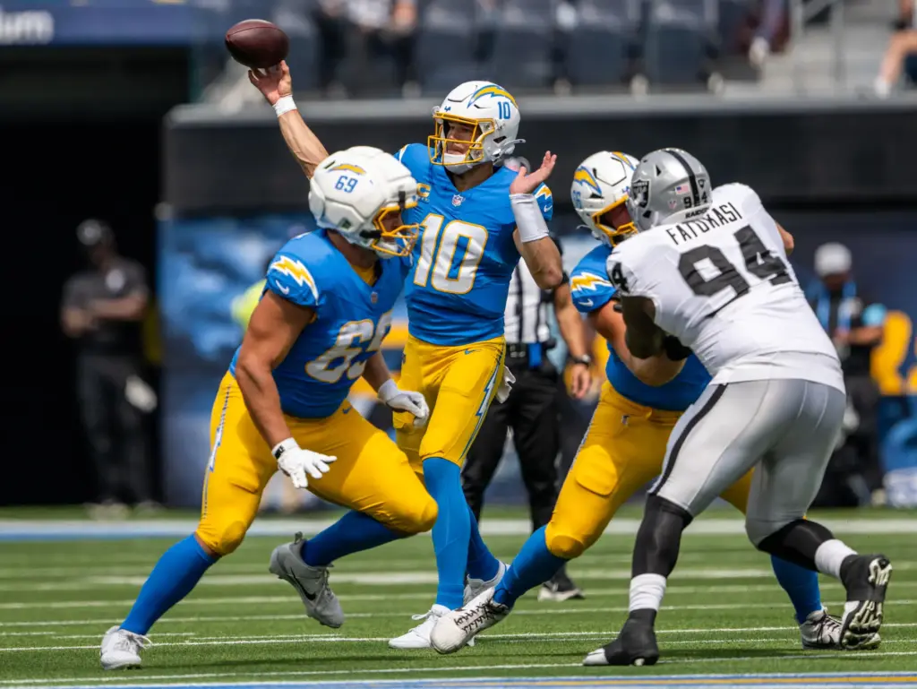 Chargers quarterback Justin Herbert (10) throws the ball during the...
