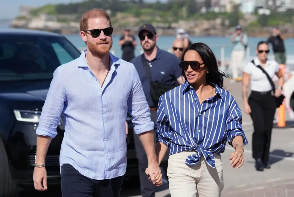 Prince Harry, and Meghan, the Duke and Duchess of Sussex, arrive for an event.