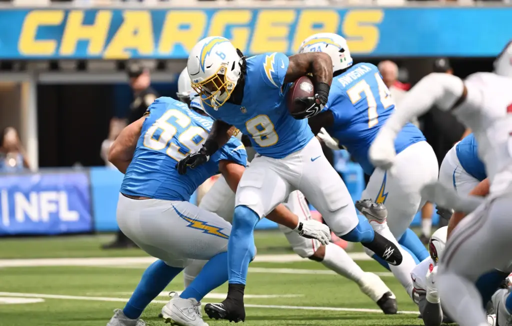 Chargers running back Omarion Hampton (8) runs for a touchdown...