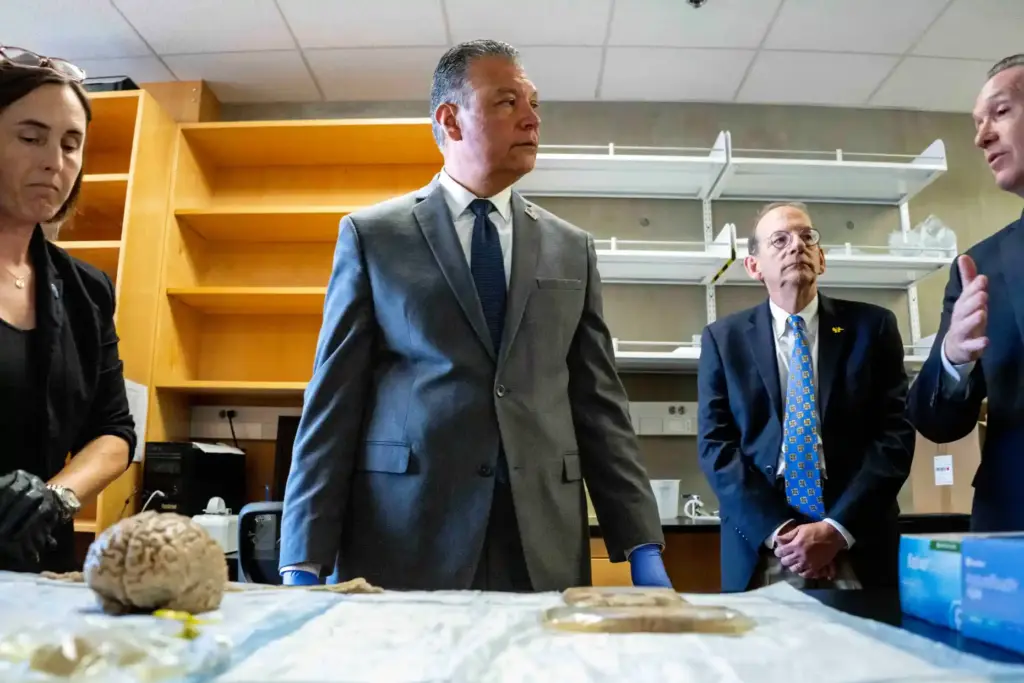 At right, Joshua D. Grill, director of UCI MIND and...