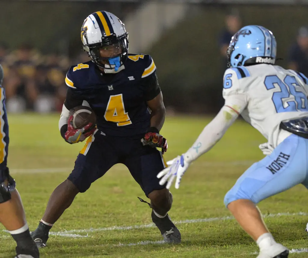 Mary Star back Mahki Huff runs near goal line against...