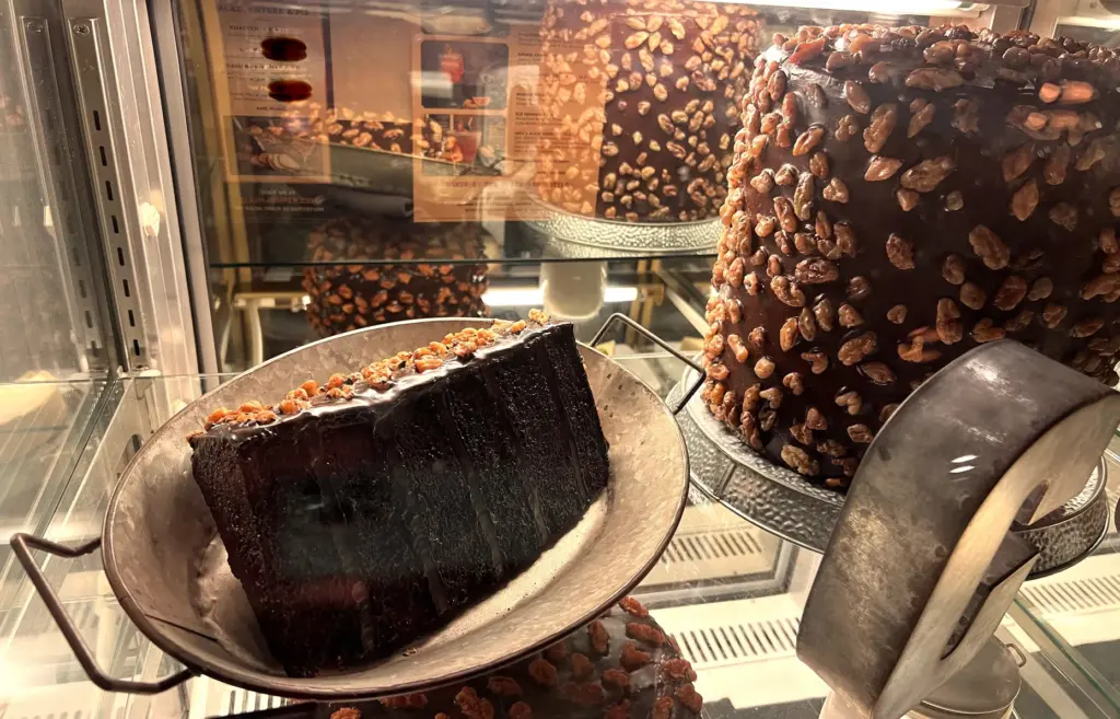 A display case shows off six-layer Chocolate Motherlode Cakes at...