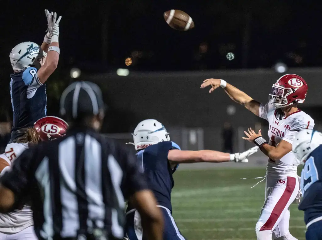 La Serna quarterback Grady Long (1) throws the ball during...