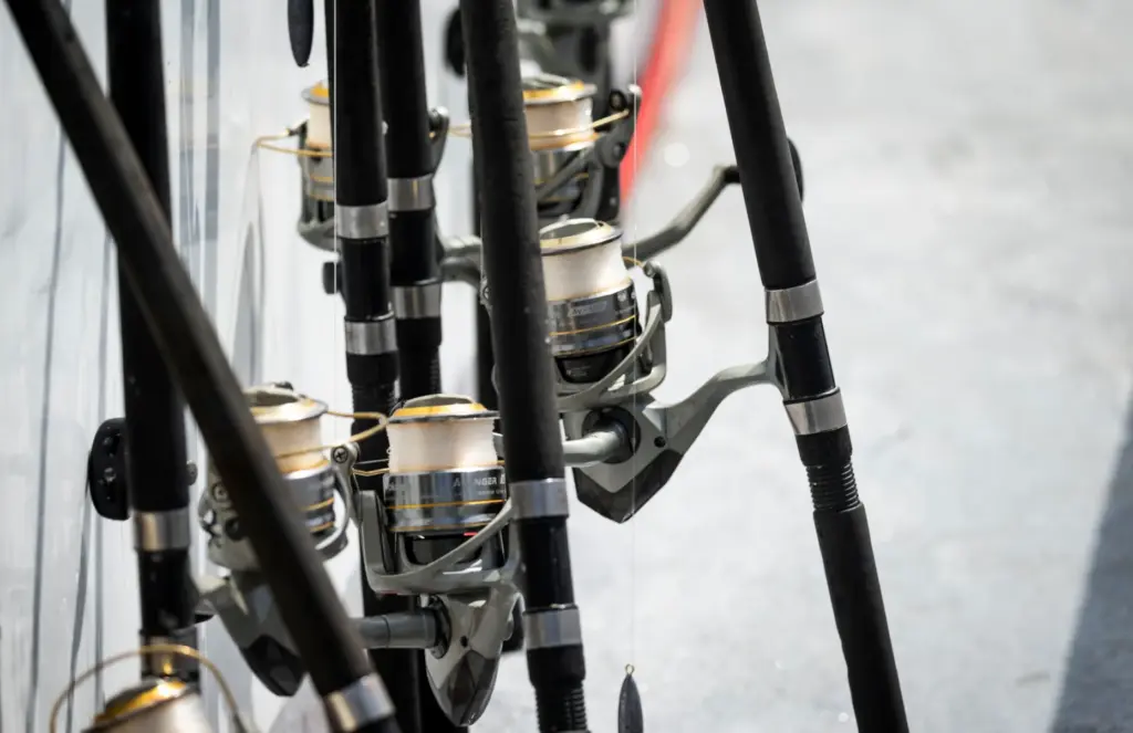 Fishing rods are readied for a yellowtail trip on the...
