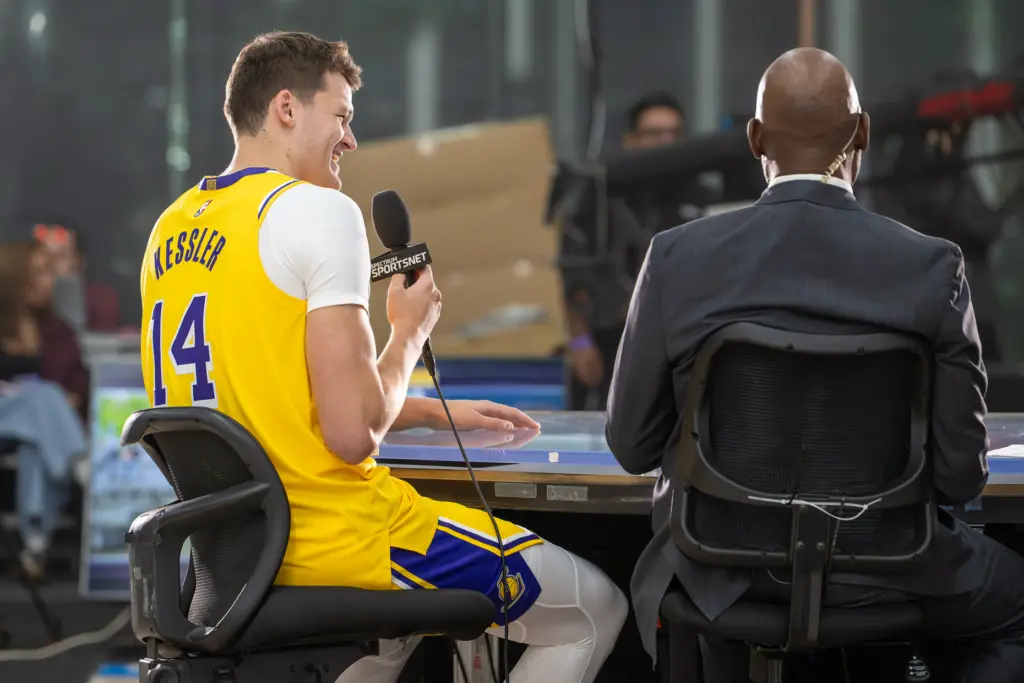 New Lakers center Walker Kessler does a TV interview during...
