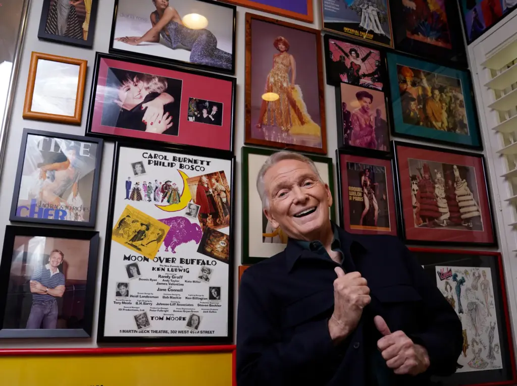 FILE – Costume and fashion designer Bob Mackie poses amongst...