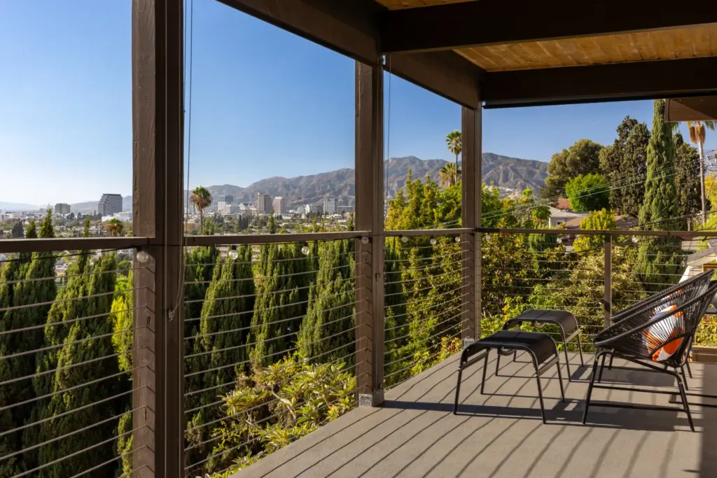 The covered deck with cable railing. (Photo by Cameron Carothers)