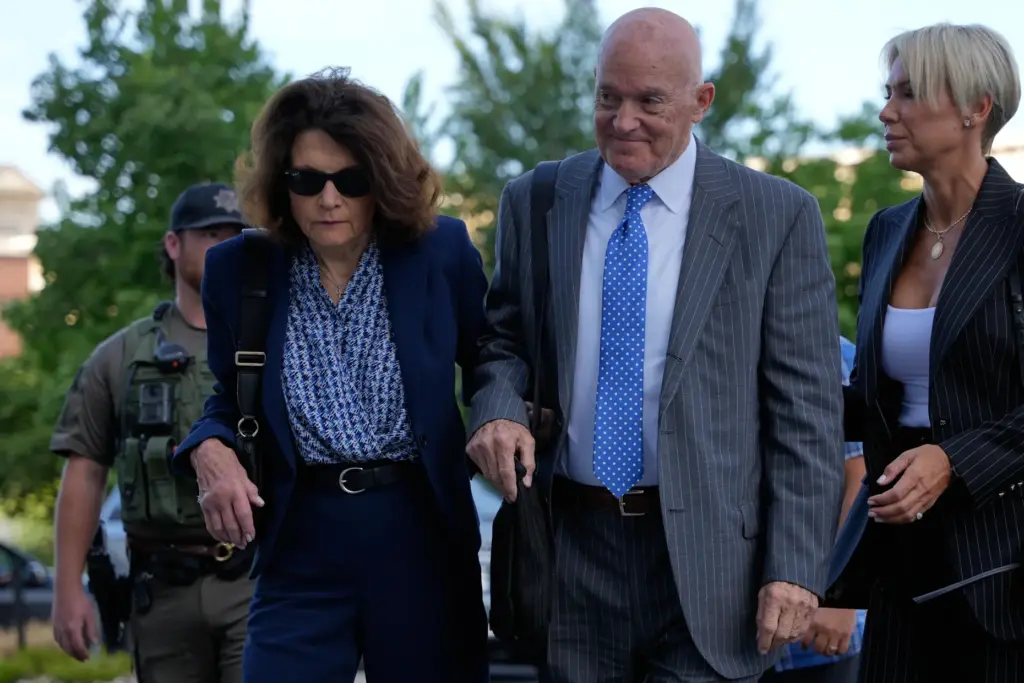 Charlie Kirk's parents, Robert and Kathryn Kirk, arrive at the Fourth District Courthouse.