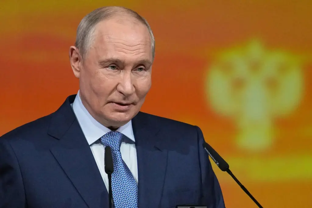 Russian President Vladimir Putin speaks at an international culture forum...