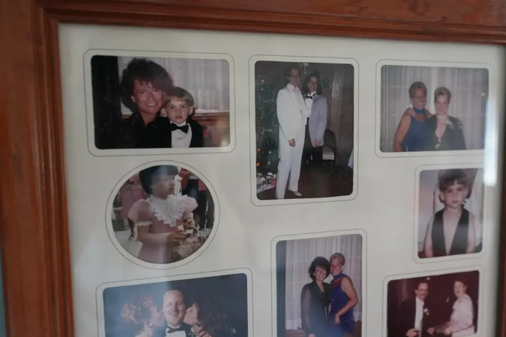 A framed collage of family photos of Deb Robertson and her wife, Kate Koubek.